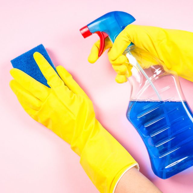 Cleaning concept with microfiber rag, gloves and cleaning spray agent